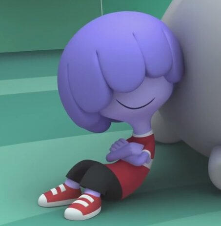 jelly jamm - ongo sitting and leaning on a white dodo like a good boy.